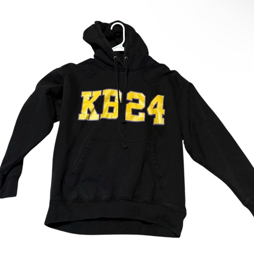 Kobe Bryant Legends Live Forever Black
Hoodie with Yellow KB24 Design
